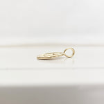 Side view to show thickness of necjklace charm pendant: Burn the Boats Motivational Charm Pendant Jewelry in Gold by Lat & Lo- Wax seal-Coin shaped jewelry-gift jewelry-inspiring necklace charm