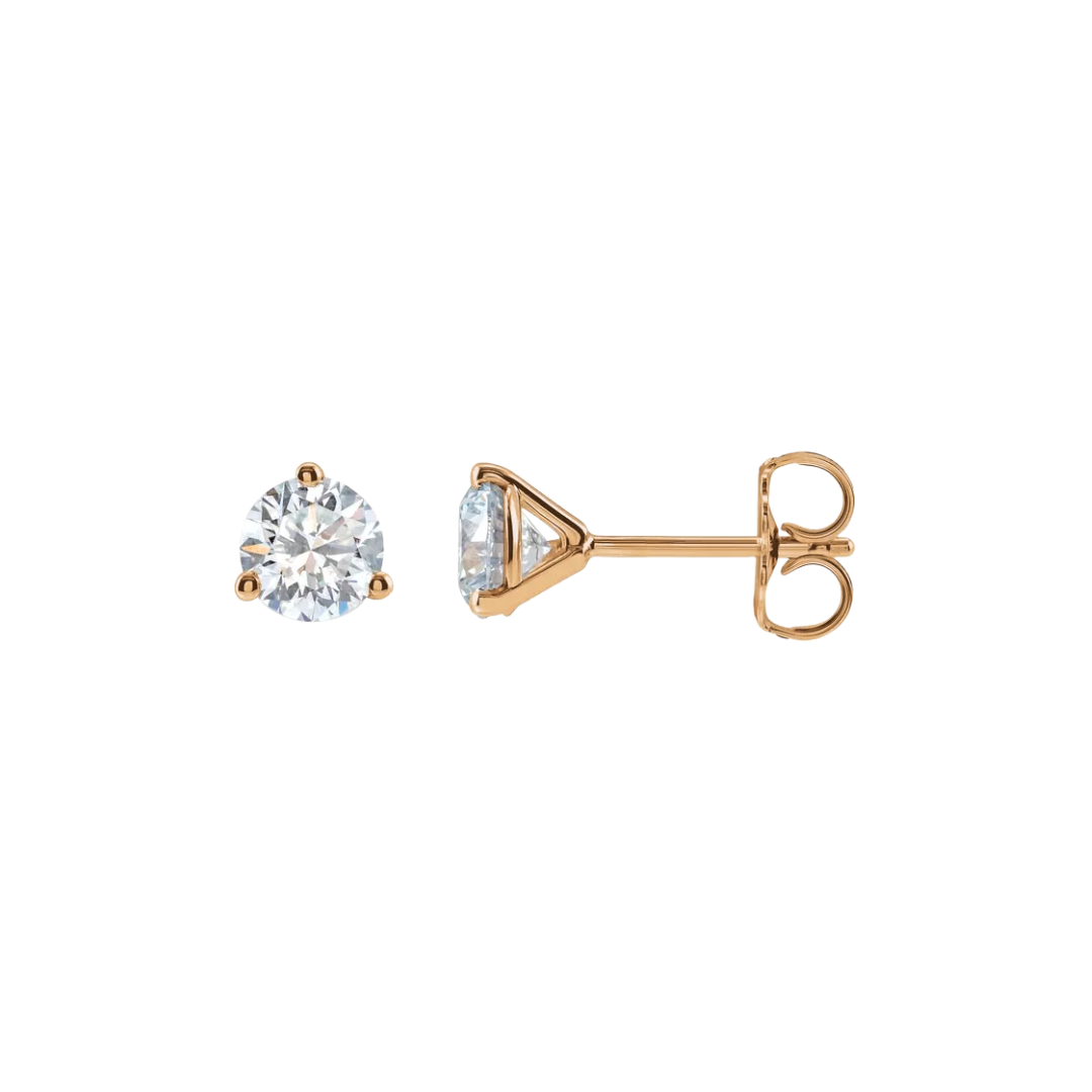 Rose gold diamond stud earrings on a white background