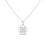 small silver round pendant with a QR engraved on it. The QR code can be personalised to lead to a unique link when scanned.