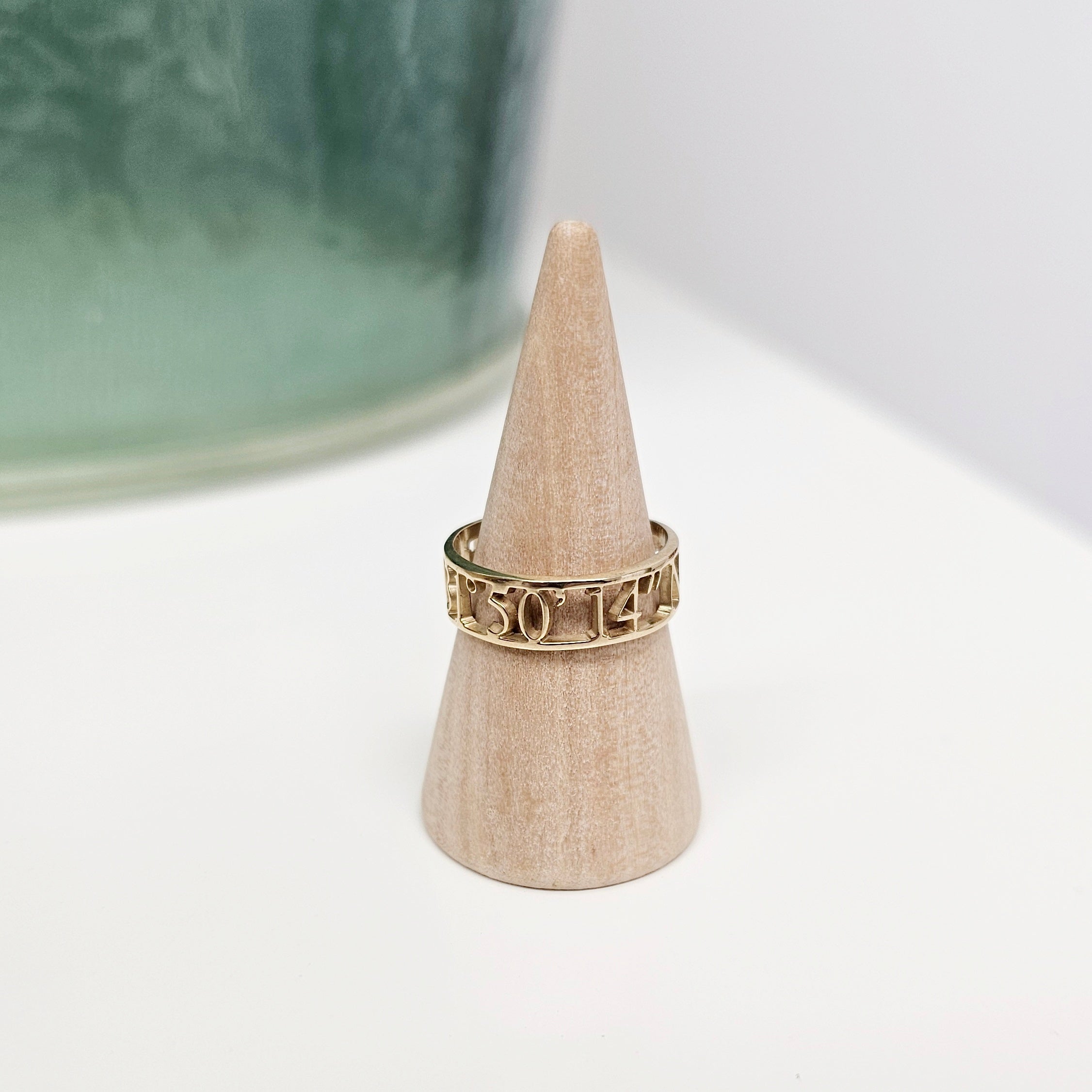 cut out style coordinates ring in gold shown on wooden display-lat & lo personalized jewlery