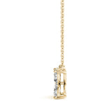 Gold necklace with a pendant on a white background