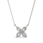 Diamond flower pendant on a chain against a white background