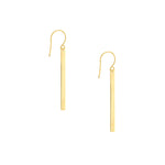 Gold bar earrings on a white background