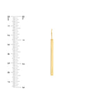 Gold Bar earrings next to a ruler on a white background for scale