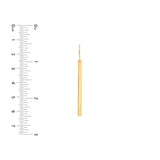 Gold Bar earrings next to a ruler on a white background for scale