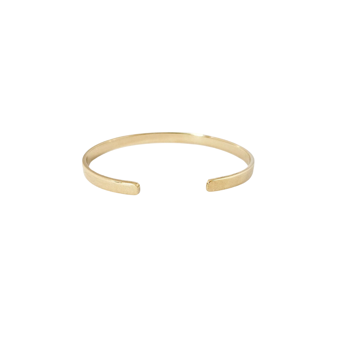 Back view of personalized gold bracelet on a white background