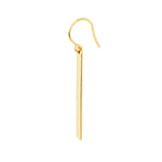 Gold bar earring on a white background