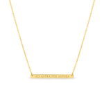 Gold necklace with engraved text: AD ATRA PER ASPERA on a white background