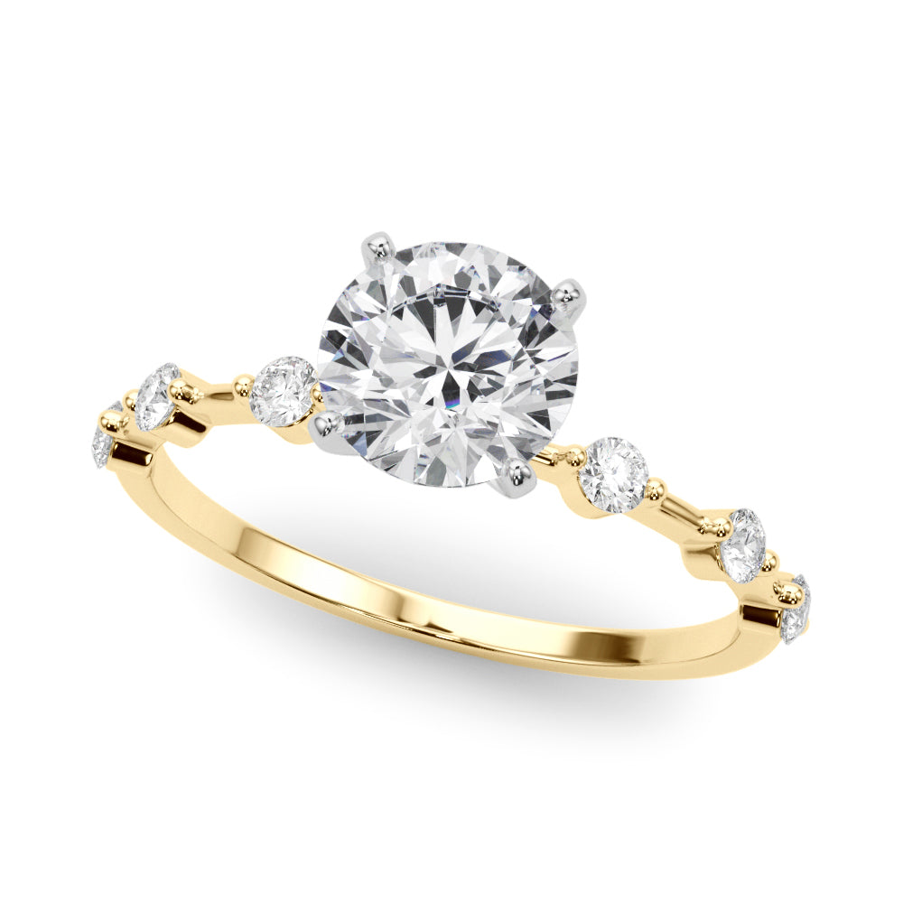 Gold ring with a large diamond and smaller diamonds on the band against a white background