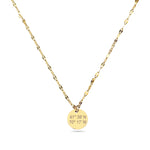 Gold necklace with a round pendant on a white background_engraved with coordinates