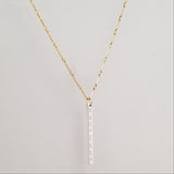 Lat & Lo Bicoastal necklace, sterling silver vertical column pendant on yellow gold filled bar and link chain, inscribed with coordinates