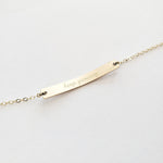 Custom back inscription view. Coordinates skinny bar bracelet in gold color. 14K Gold-Filled. Latitude longitude bracelet by lat & lo.