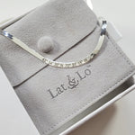 sterling silver herringbone necklace with coordinates by Lat & Lo shown with gift packaging
