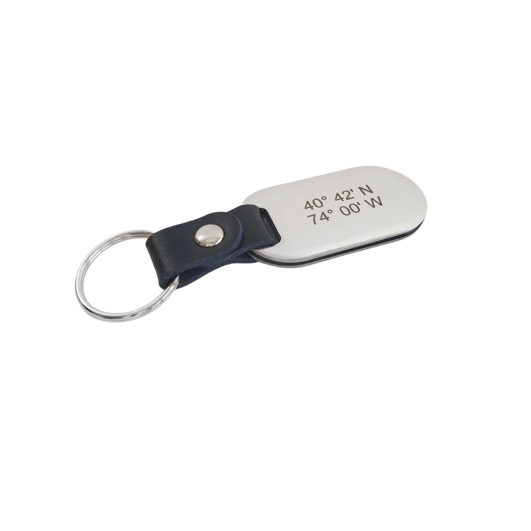 stainless steel and leather keychain engraved with latitude longitude coordinates by Lat & Lo. www.latandlo.com