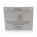 Lat & Lo Disc Necklace on a Grace display card, coordinates inscribed lead to Bethlehem, 14K gold filled