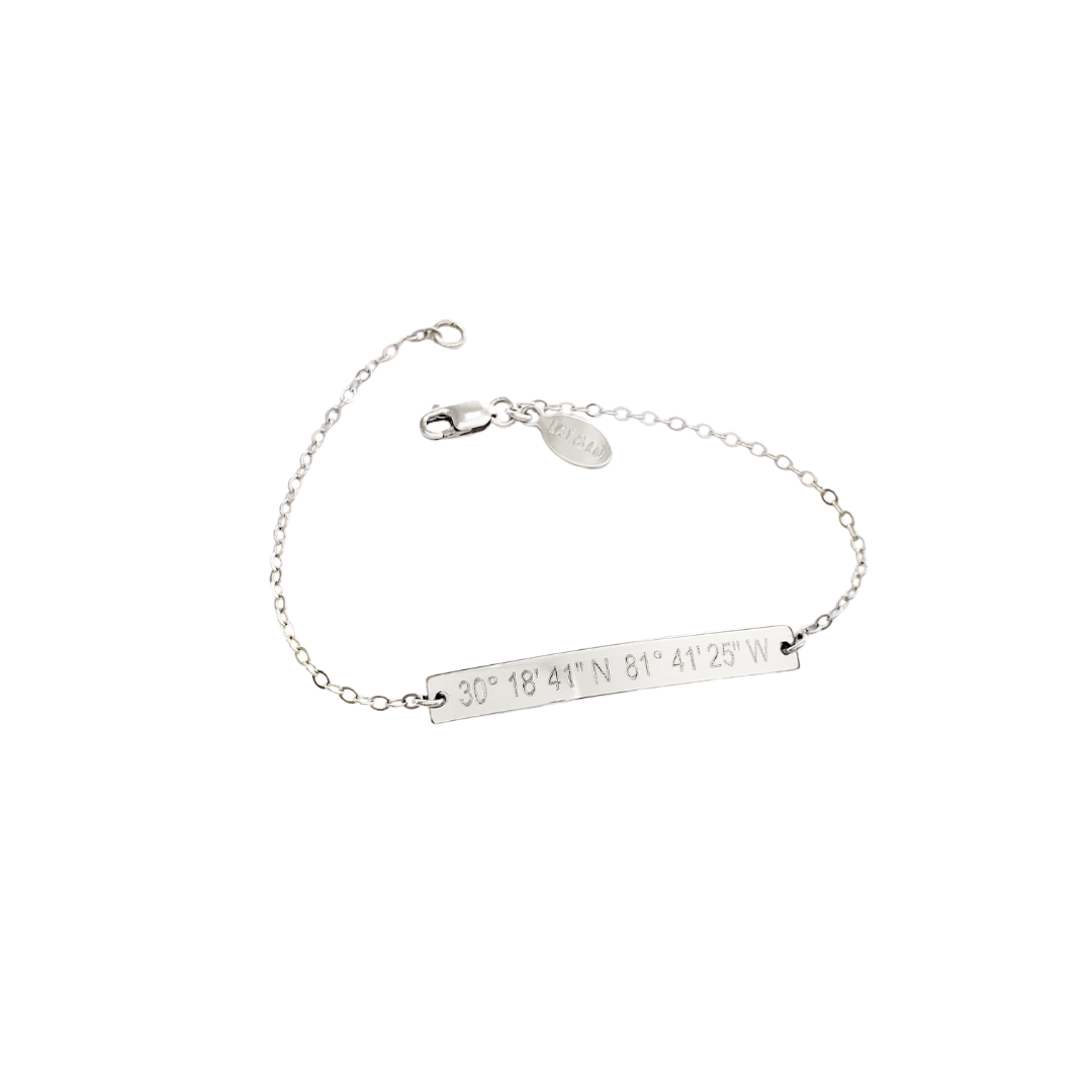 Coordinates skinny bar bracelet in silver color. .925 Sterling Silver. Latitude longitude bracelet by lat & lo.